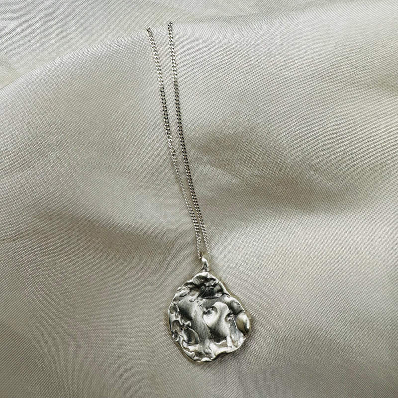 Cave Coin Style Silver Pendant Necklace
