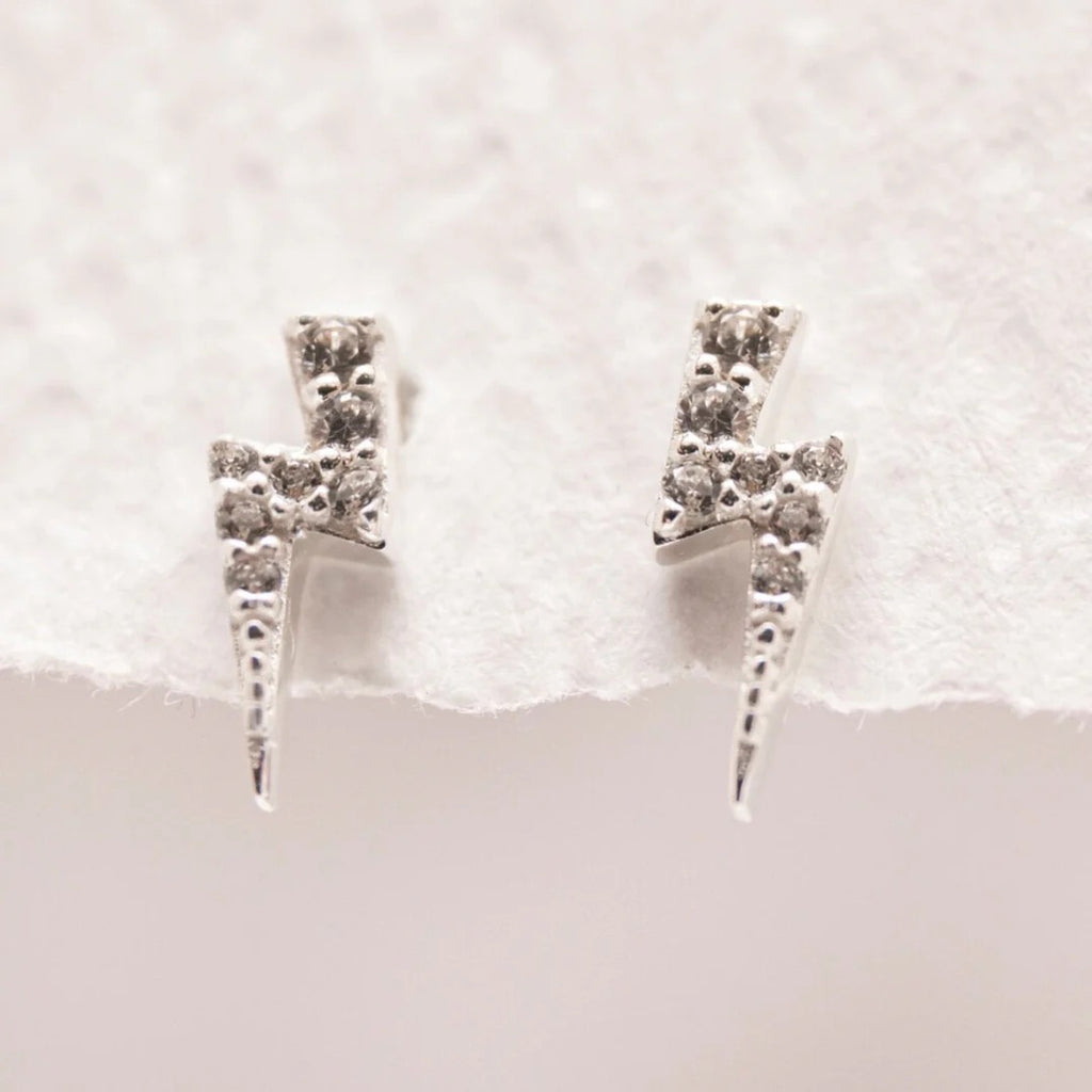 SPARKLY SILVER LIGHTNING BOLT STUD EARRINGS • Ada Gallery