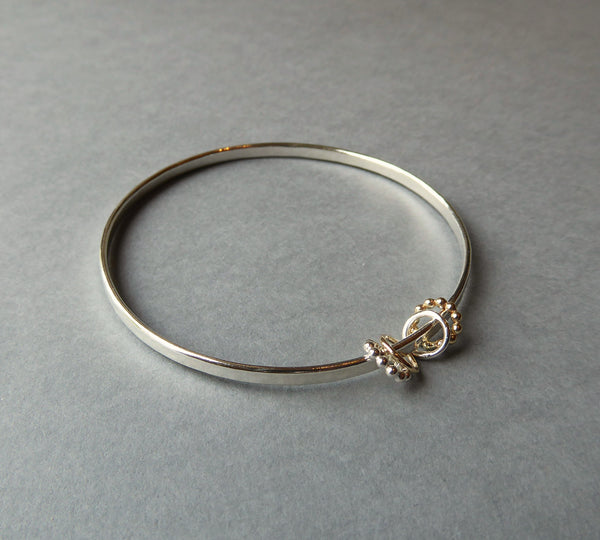 Silver & 14ct Gold Filled Bangle With Four Moving Rings