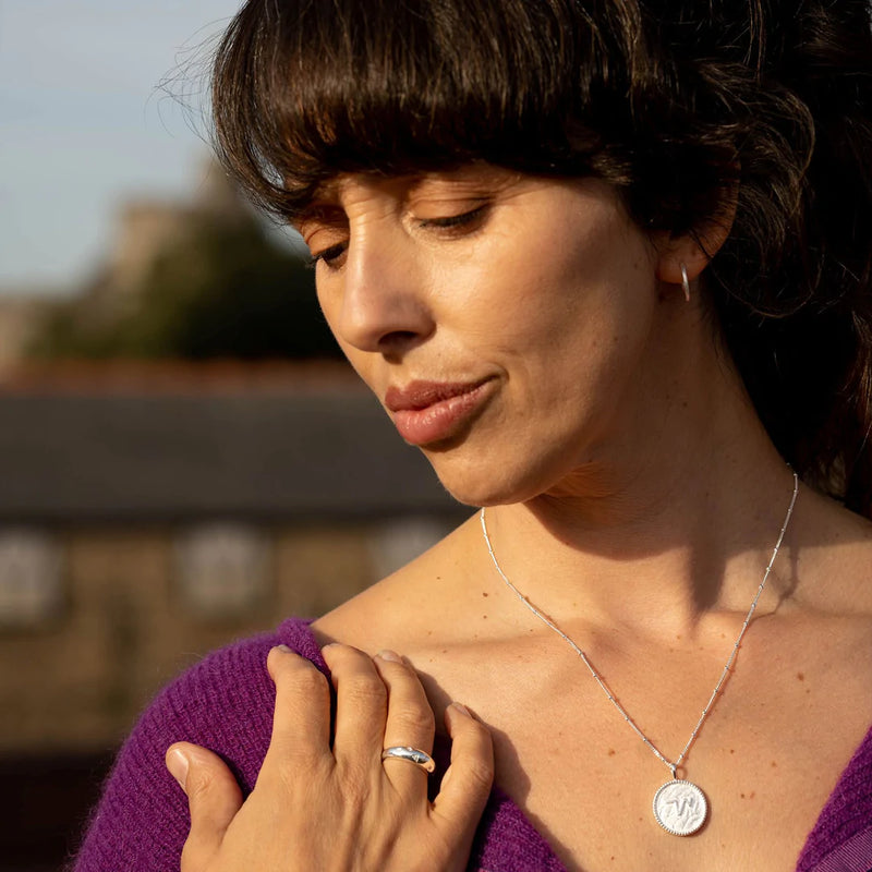 "THRIVE" SHORTHAND SILVER COIN NECKLACE