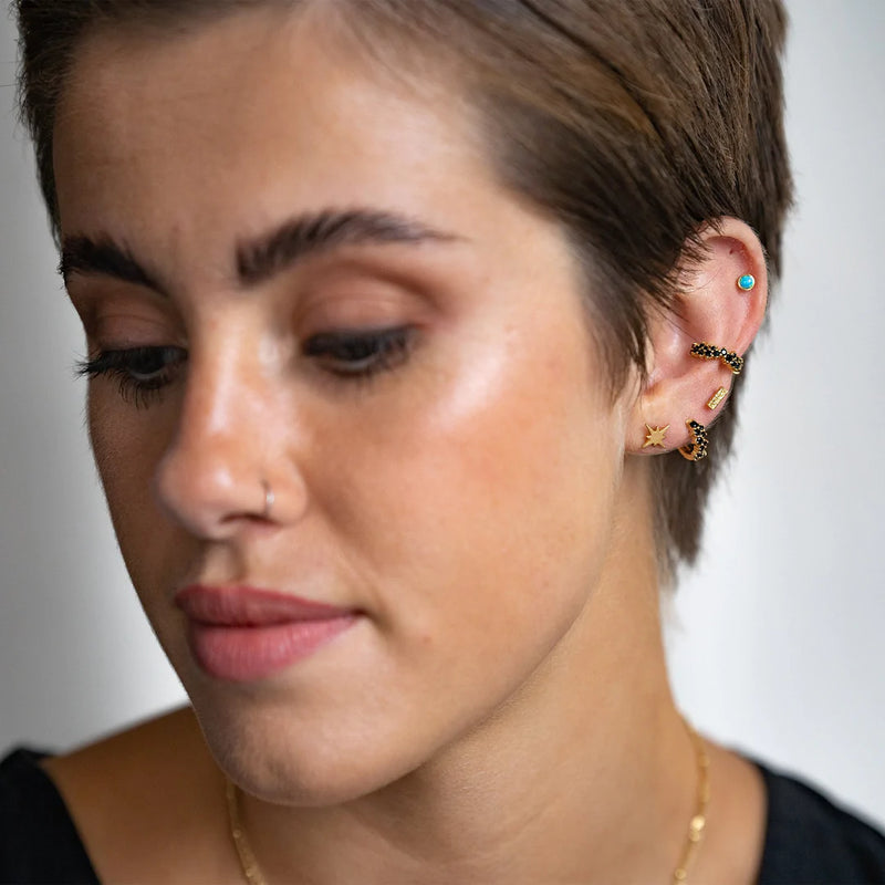 BRUSHED GOLD NORTH STAR STUD EARRINGS