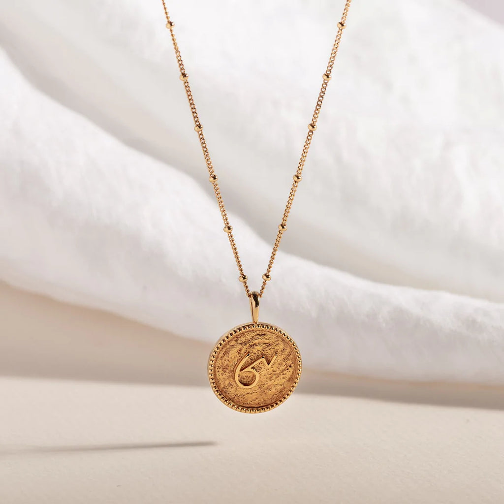 Womens gold 2025 coin necklace
