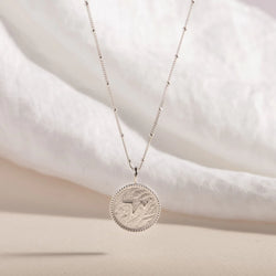 "THRIVE" SHORTHAND SILVER COIN NECKLACE