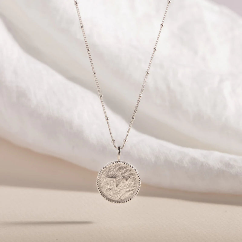 "THRIVE" SHORTHAND SILVER COIN NECKLACE